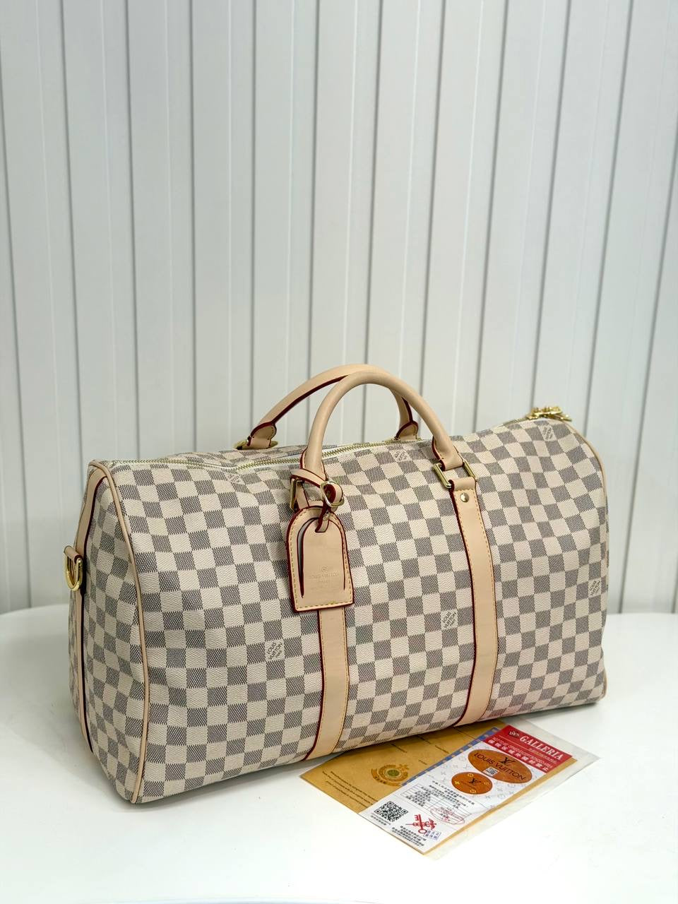 LV Keepall Bandoulière 55