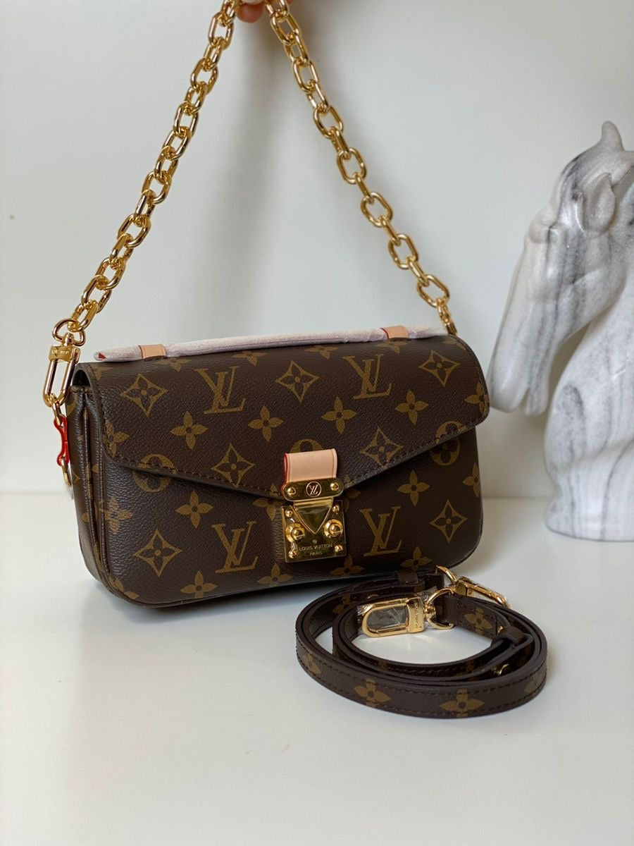 LV Pochette Métis East-West